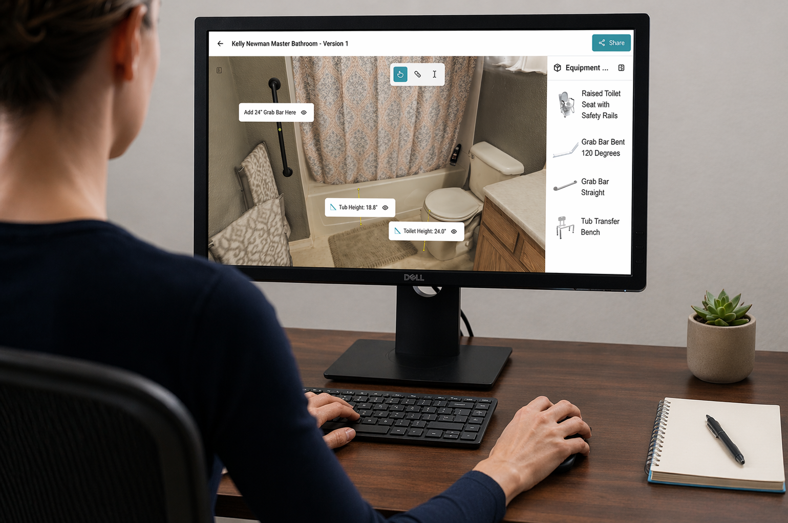 An occupational therapist at a desk reviewing a captured bathroom assessment, with measurements on screen and recommended equipment listed alongside